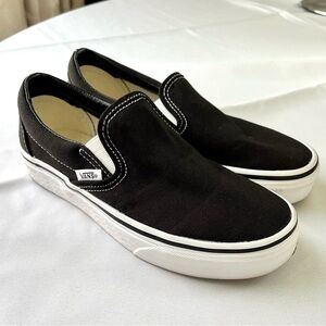 Women’s black slip-on Vans.  **EVERYTHING MUST GO, MOVING SALE**